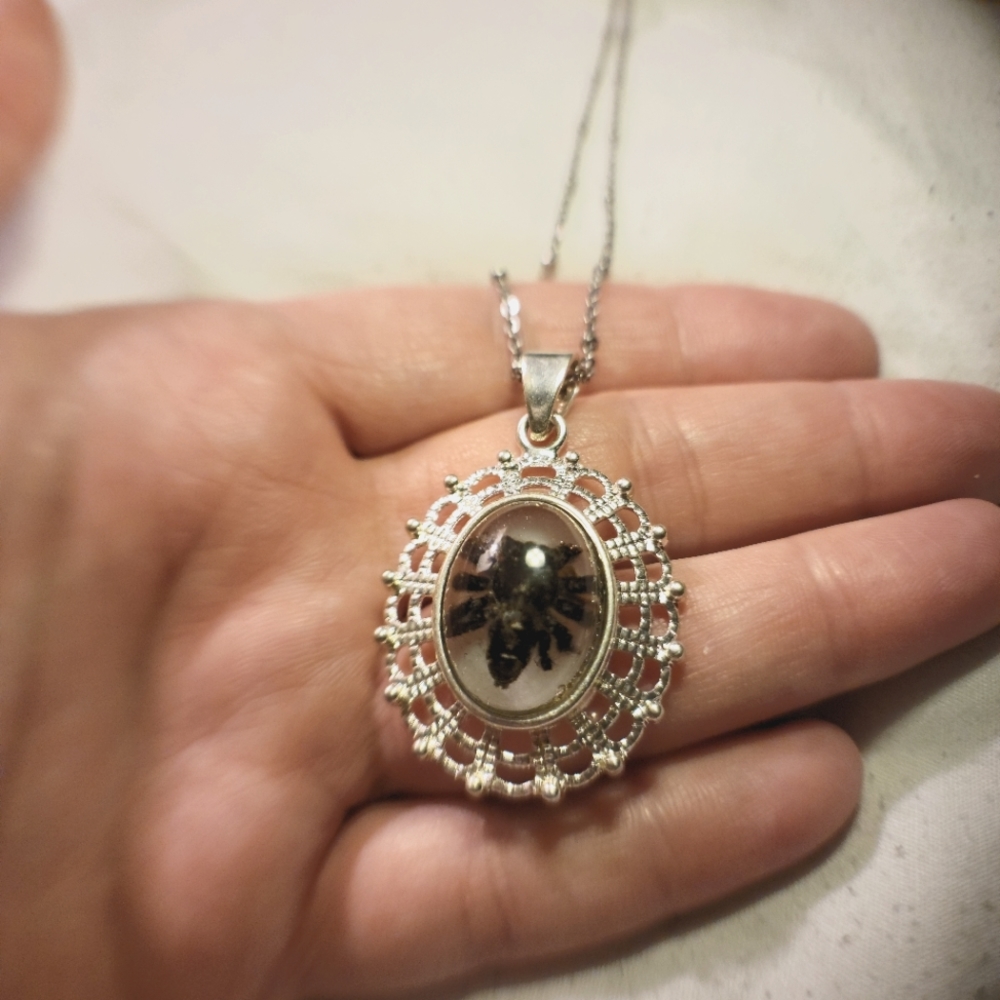 Spider shed necklace